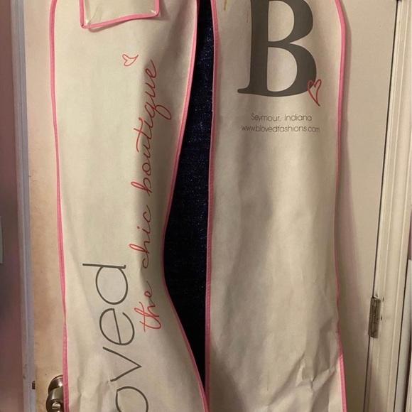 Two prom dresses never worn. Blue is size 4, gold is size 0. Still in bags - Picture 1 of 9